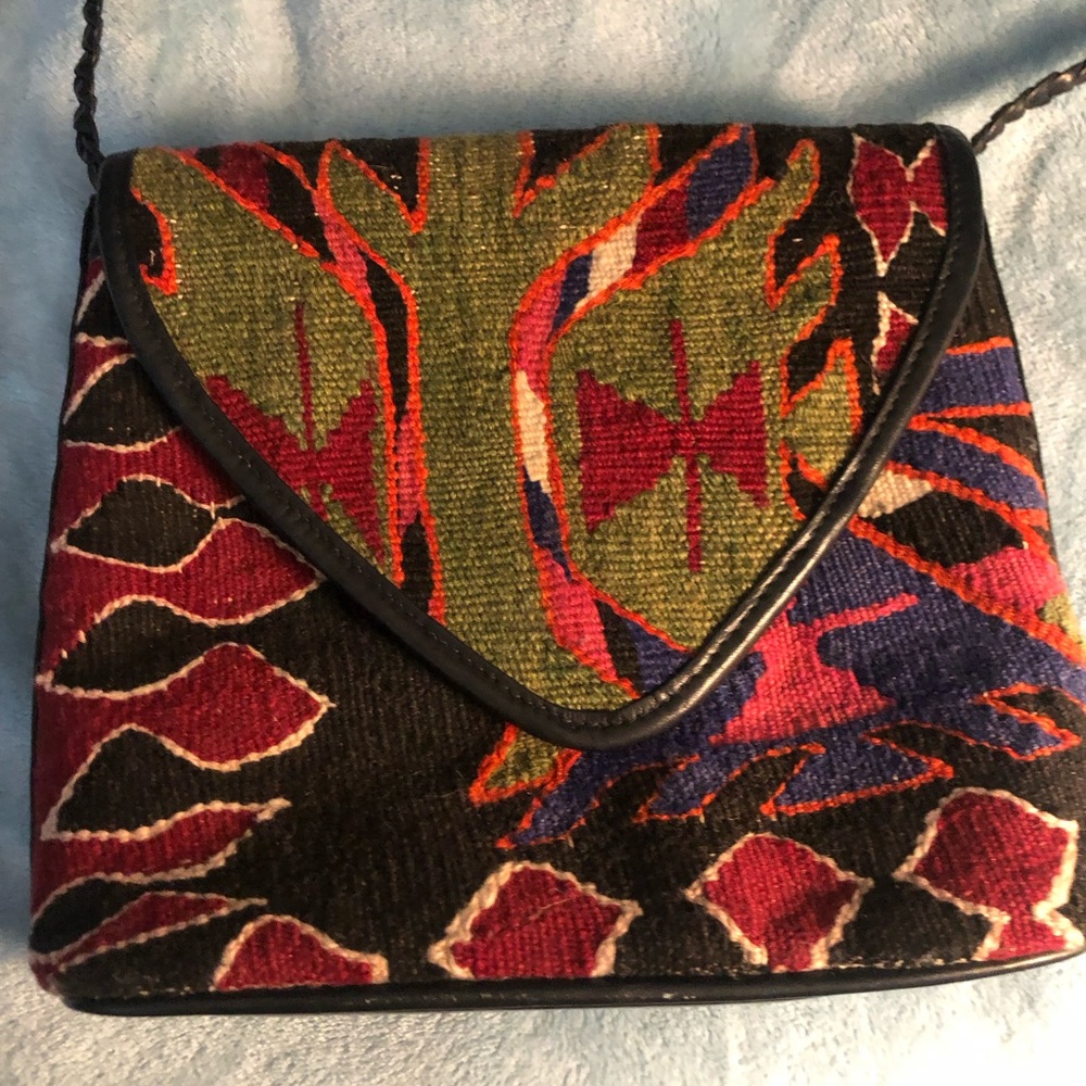 Crossbody/purse.  Black with colorful stitching.